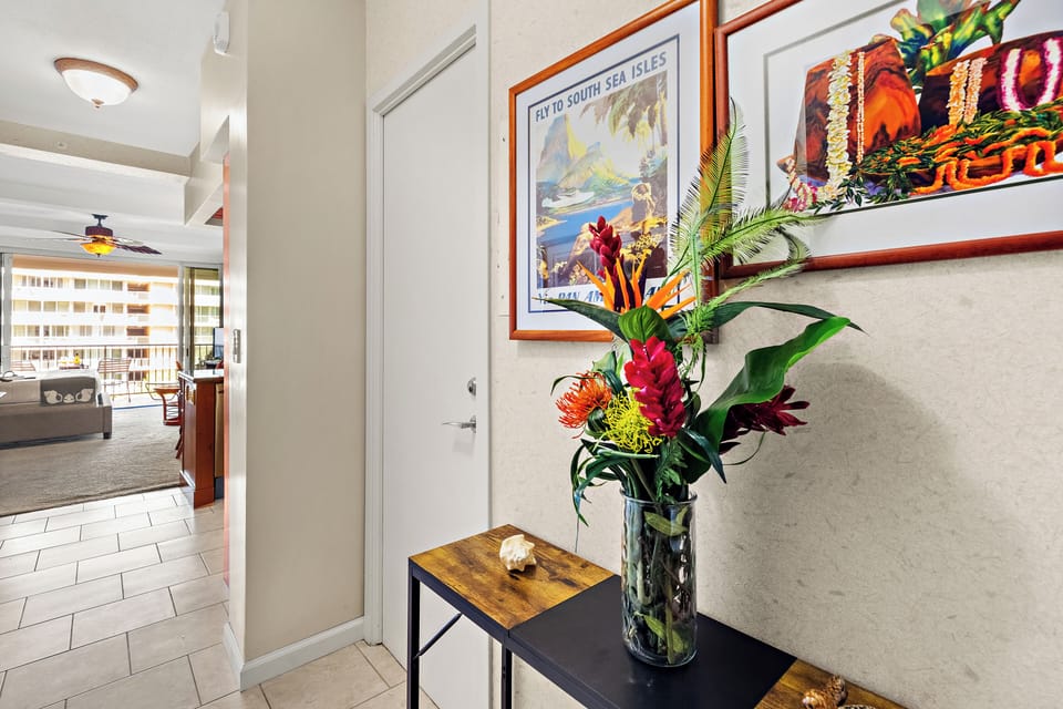 A tranquil island welcome greets you the moment you arrive, inviting you to slow down and settle in. Step into a bright, airy entryway where soft natural light and gentle coastal touches create an immediate sense of calm.