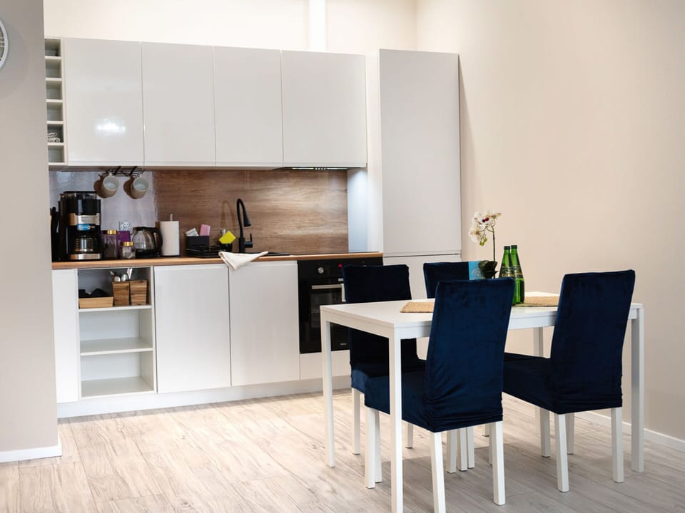 Apartment | Private kitchen | Electric kettle, highchair