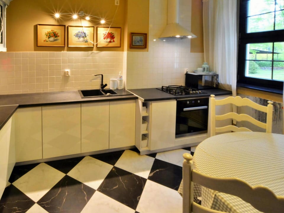 Villa | Private kitchen | Electric kettle, toaster, highchair