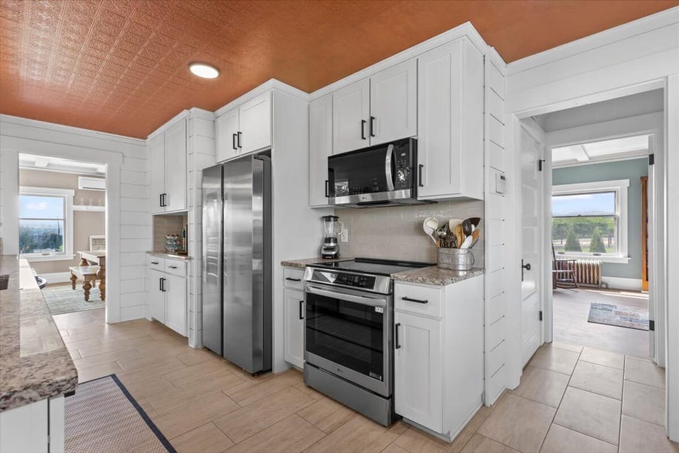 The refrigerator, microwave and stove.