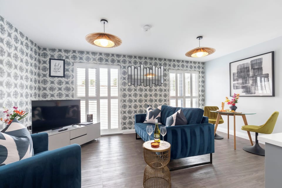 Apartment | Living area | 50-inch Smart TV with cable channels, Netflix, streaming services
