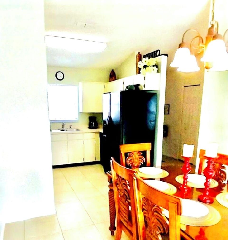 Dining seating is just off the kitchen