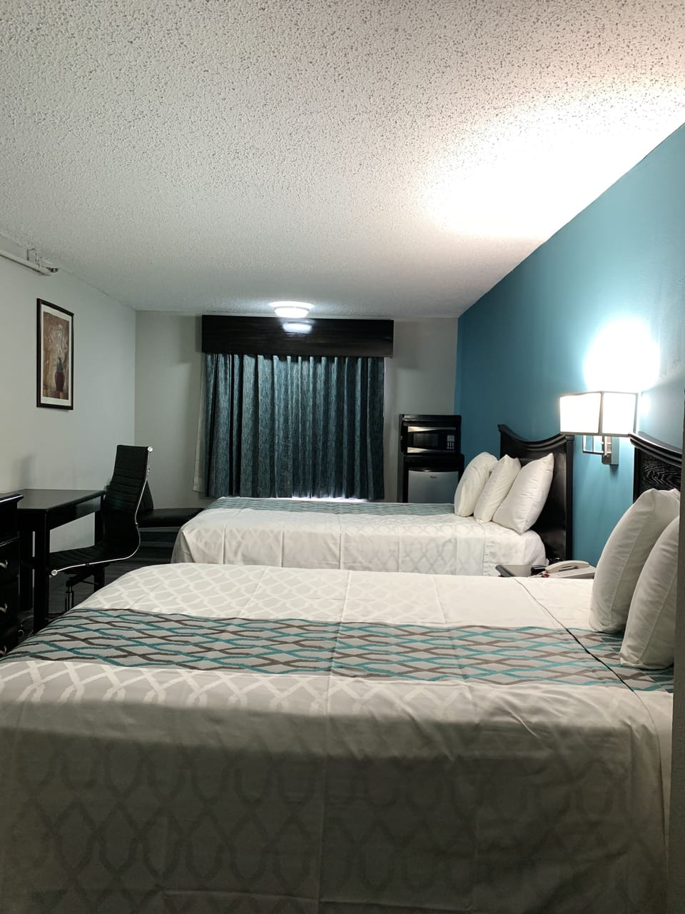 Desk, laptop workspace, free WiFi, bed sheets