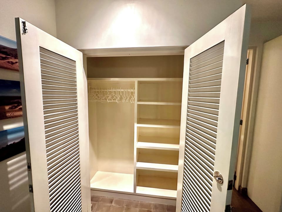 First of two closets in second bedroom