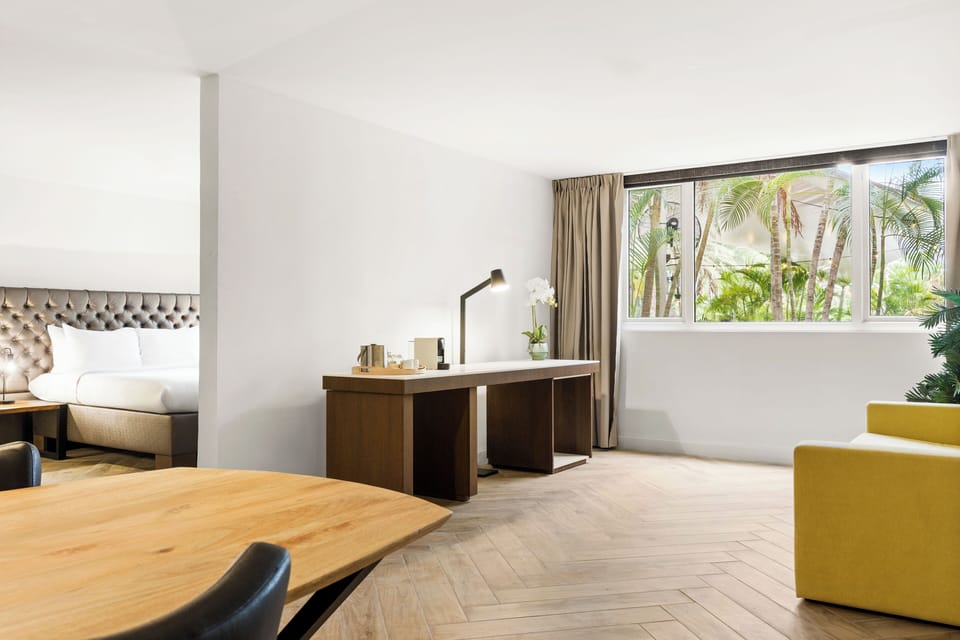 Superior Suite, 1 King Bed with Sofa bed | Living area | 32-inch Smart TV with digital channels