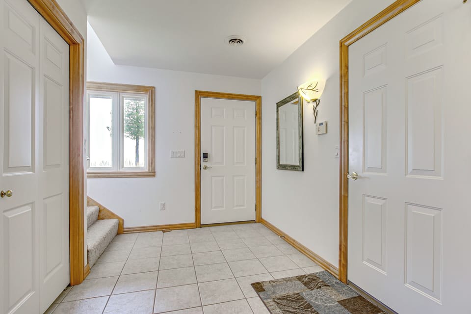 Stairs to Lower Level | Main Entrance | 1st Floor