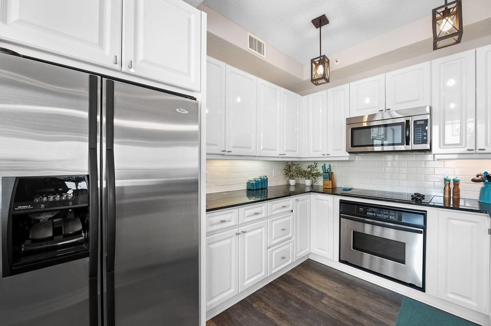 Condo, Multiple Beds (Beach Colony East 14D) | Private kitchen | Oven, toaster, paper towels