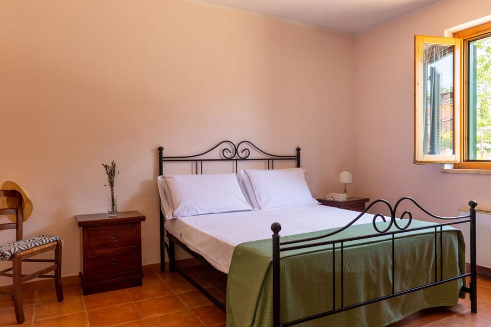 Nice three-room apartment in typically Tuscan style on the ground or first floor of approximately 50 m2 located in the area around the swimming pools.It is composed of a living room with dining area, flat-screen television and sofa bed, kitchenette equip Apartment in Tuscany