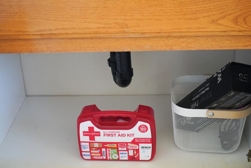 **First-aid kit, located under the sink in the master bedroom.**