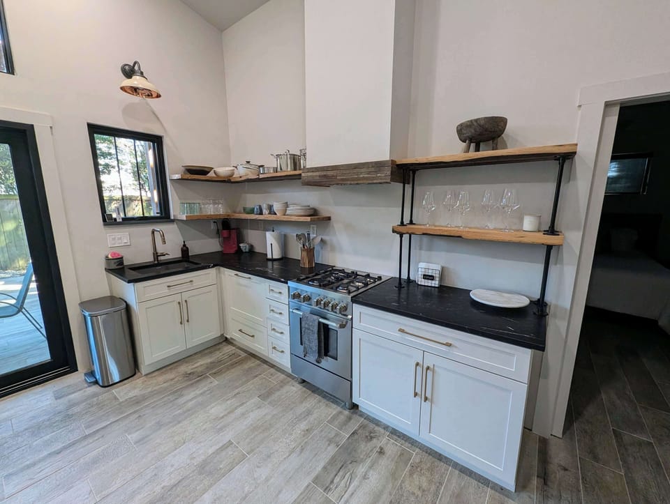 Well stocked kitchen with gas stove
