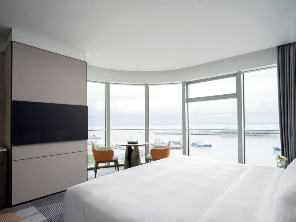 Junior Suite, 1 King Bed | Down comforters, minibar, in-room safe, desk