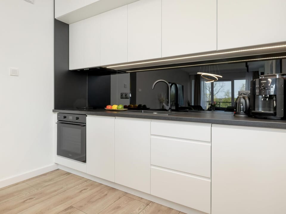 Apartment | Private kitchen | Electric kettle, highchair