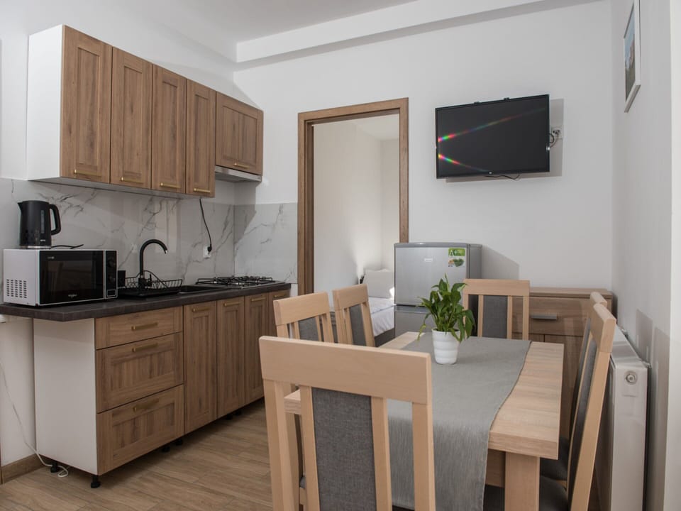 Apartment | Private kitchen | Electric kettle, highchair