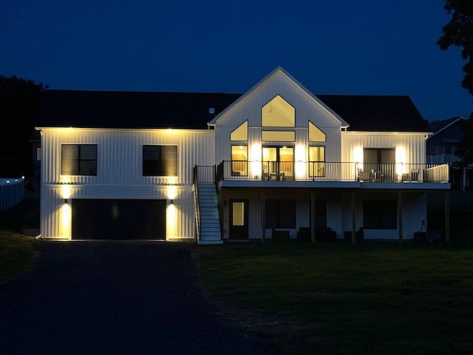 Elegantly lit and beautifully designed, this modern retreat welcomes you home after a perfect Finger Lakes day. 