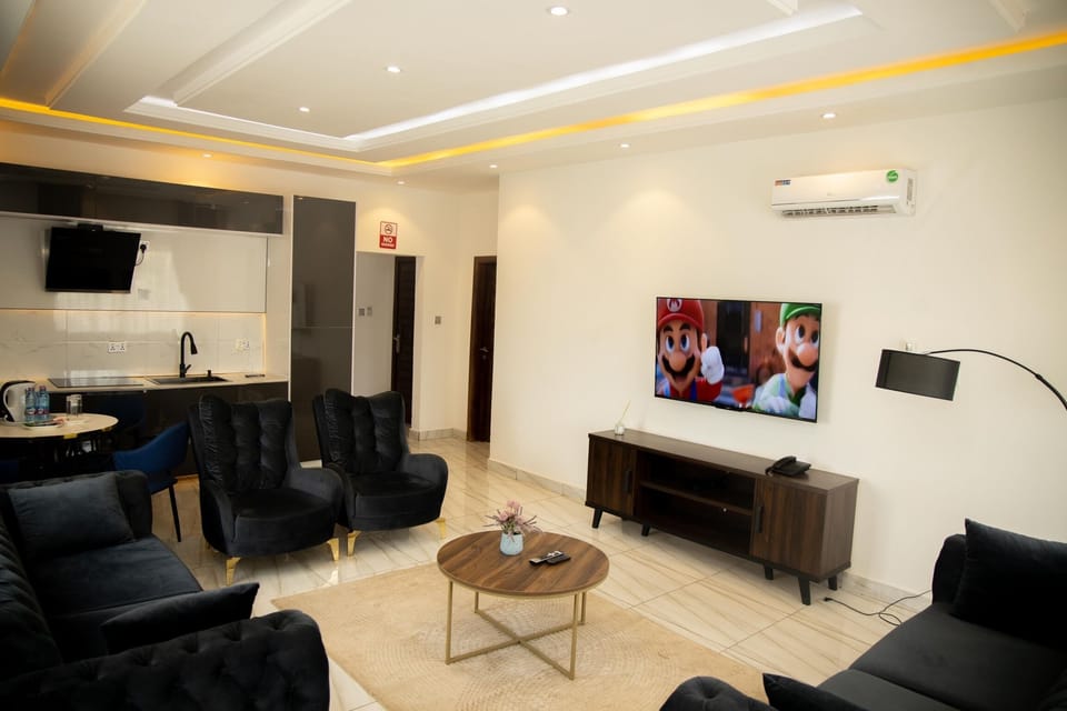 Grand Suite, Pool View | Living area | 43-inch Smart TV with satellite channels, Netflix, streaming services