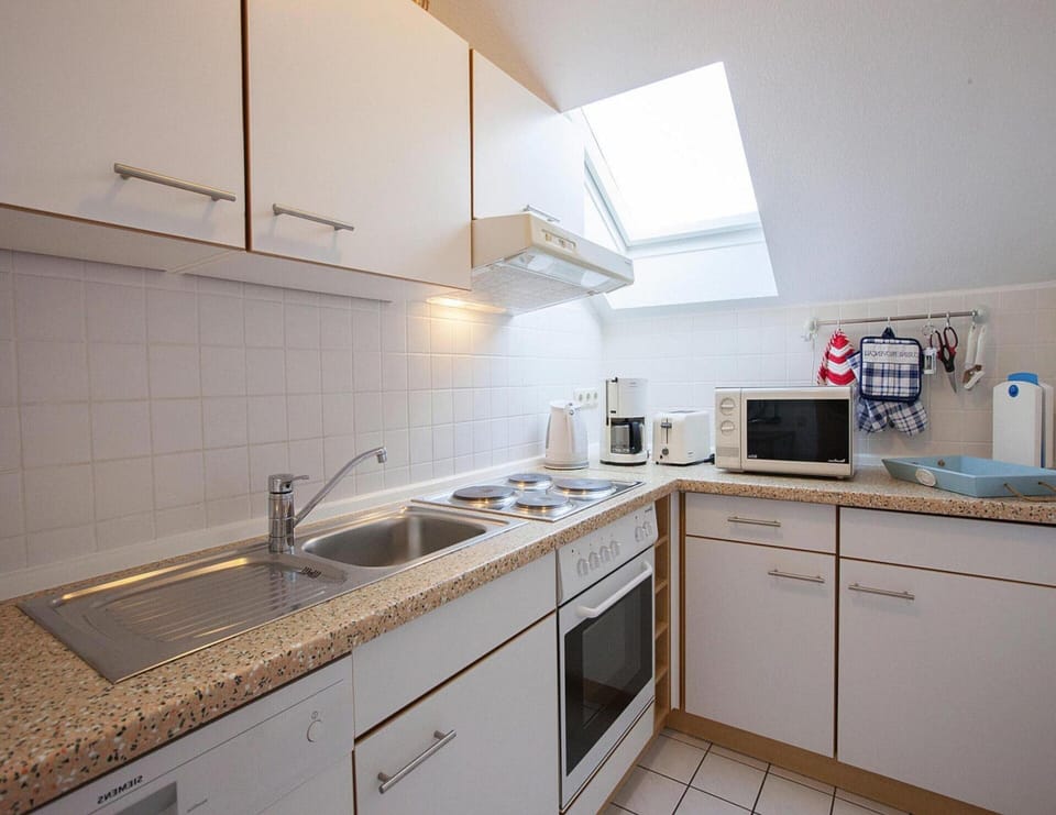 Apartment | Private kitchen | Electric kettle, toaster, highchair