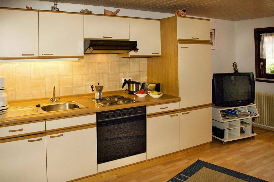 Apartment | Private kitchen | Electric kettle, toaster, highchair