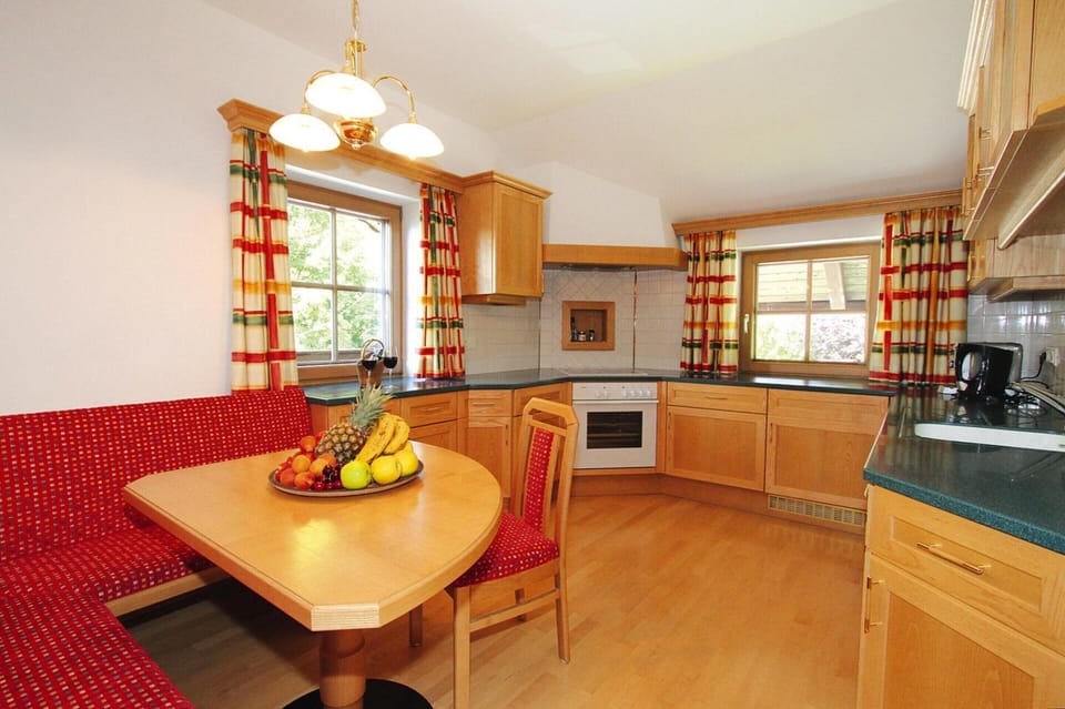 Apartment | Private kitchen | Stovetop, electric kettle, highchair