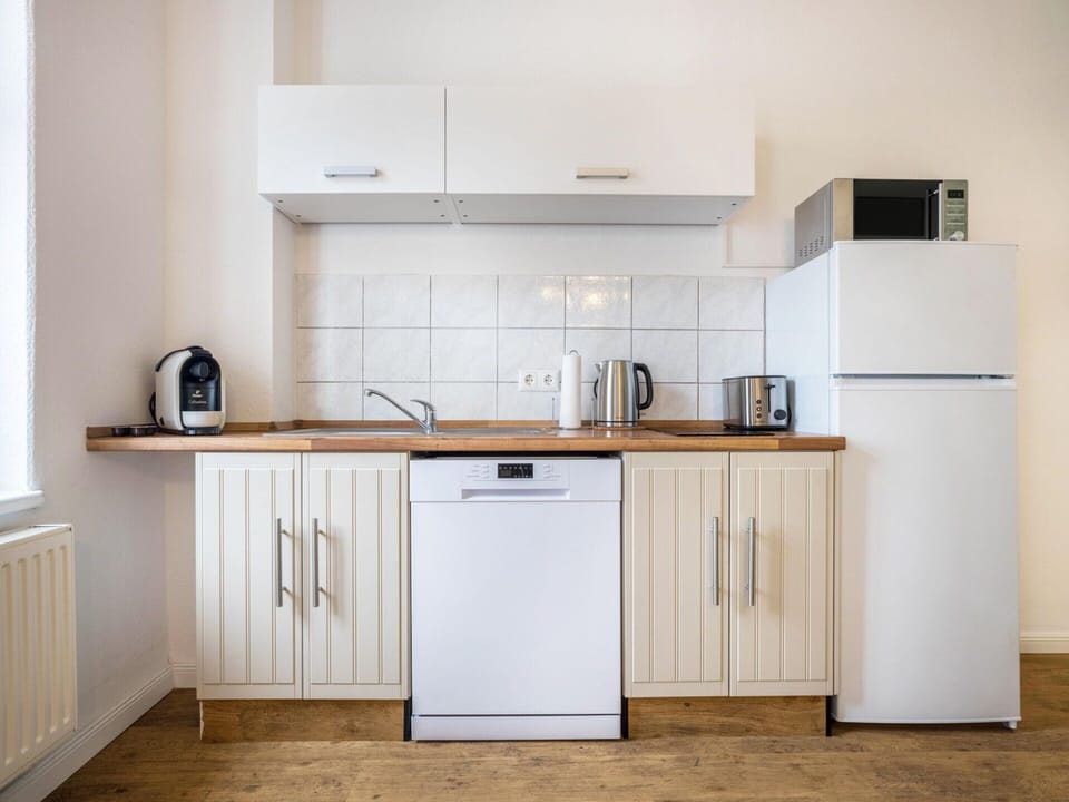 Apartment | Private kitchen | Electric kettle, toaster, highchair