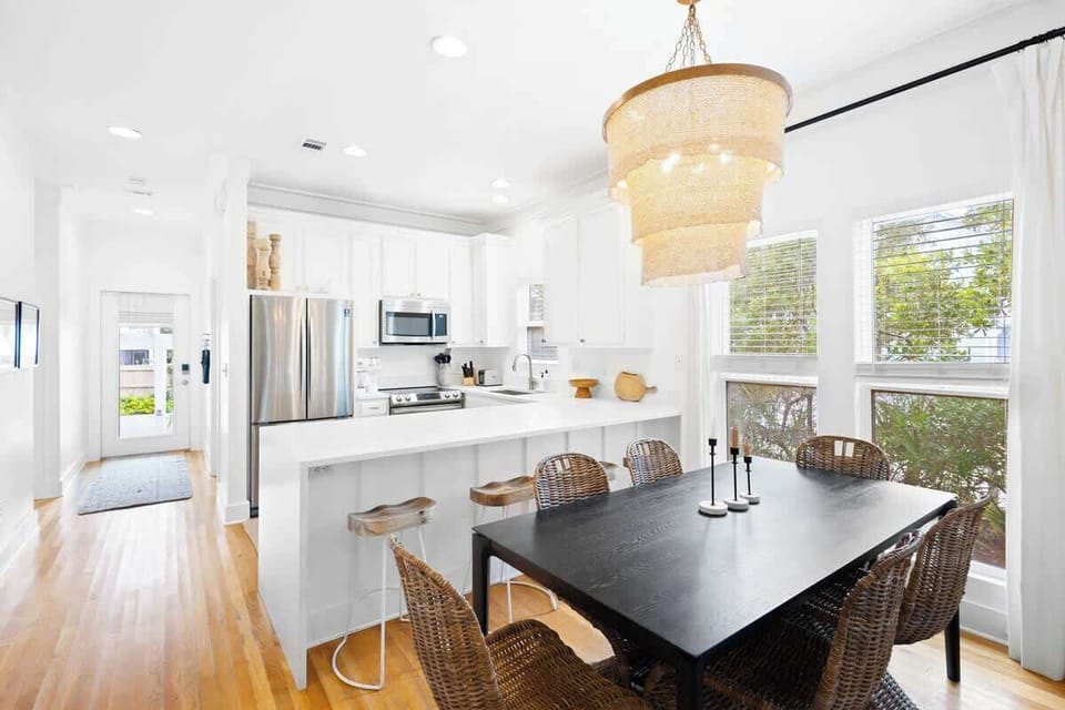 Large kitchen island includes seating for 4.