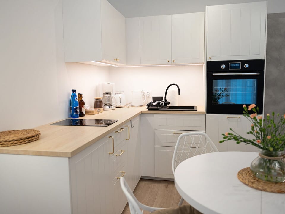 Apartment | Private kitchen | Electric kettle, toaster, highchair