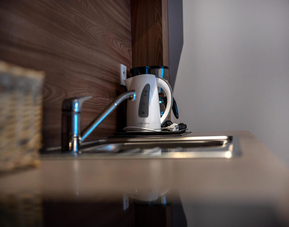 Apartment | Private kitchen | Electric kettle, highchair