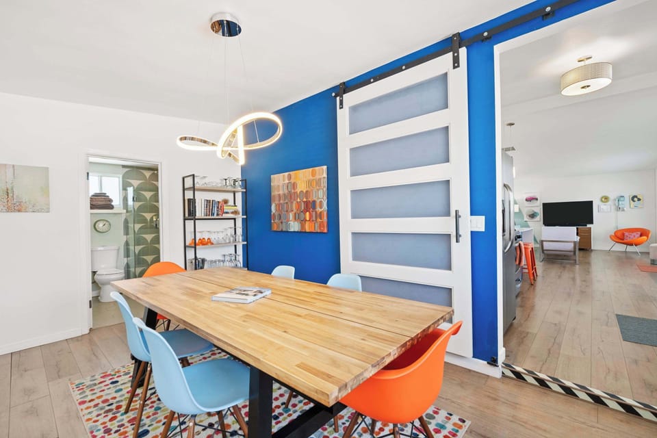 Additional living space with dining table, desk space, and sofa sleeper 
