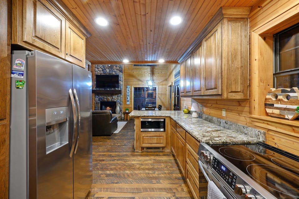 Walking back through the kitchen towards the living room you'll see the built in microwave.