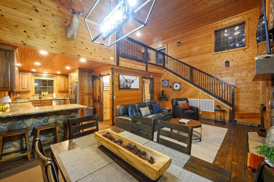 The living room is a beautiful central anchor to the cabin where everyone can gather and feel connected.