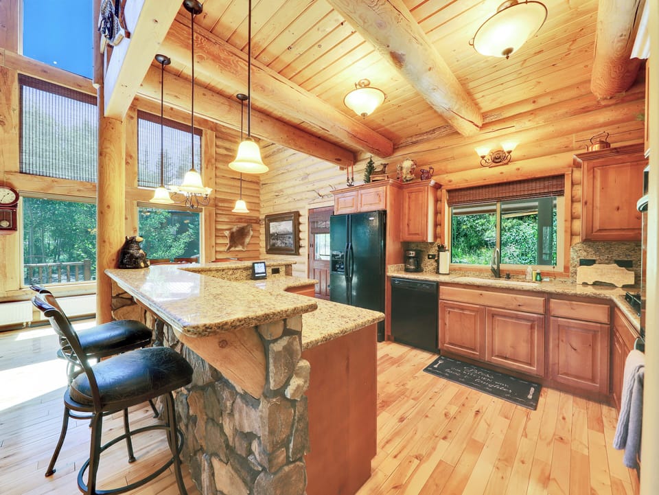 Kitchen with Updated Appliances: Dishwasher, Gas Stove, Microwave and French Door Refrigerator/Freezer, Double Ovens and