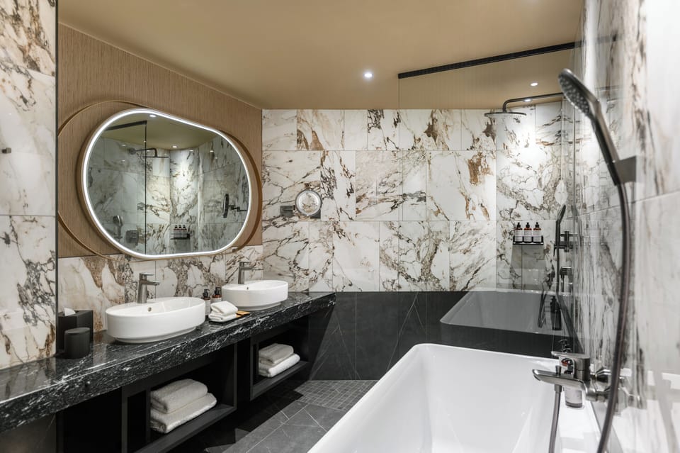 Premium Studio, Balcony, Lake View | Bathroom | Hair dryer, slippers, towels, soap