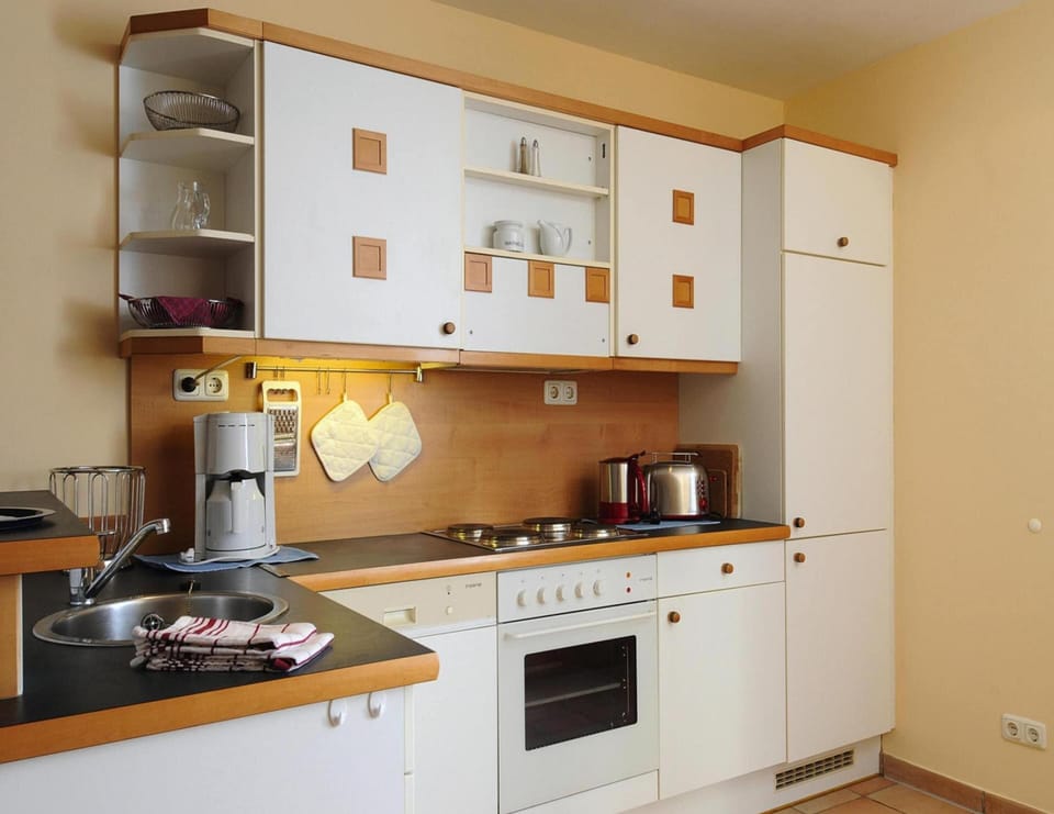 Apartment | Private kitchen | Electric kettle, toaster, highchair