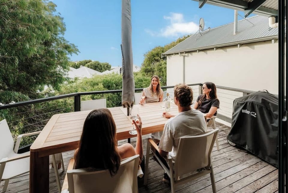 Enjoy laid-back outdoor dining on the private balcony, complete with a BBQ grill and lush surroundings. 
