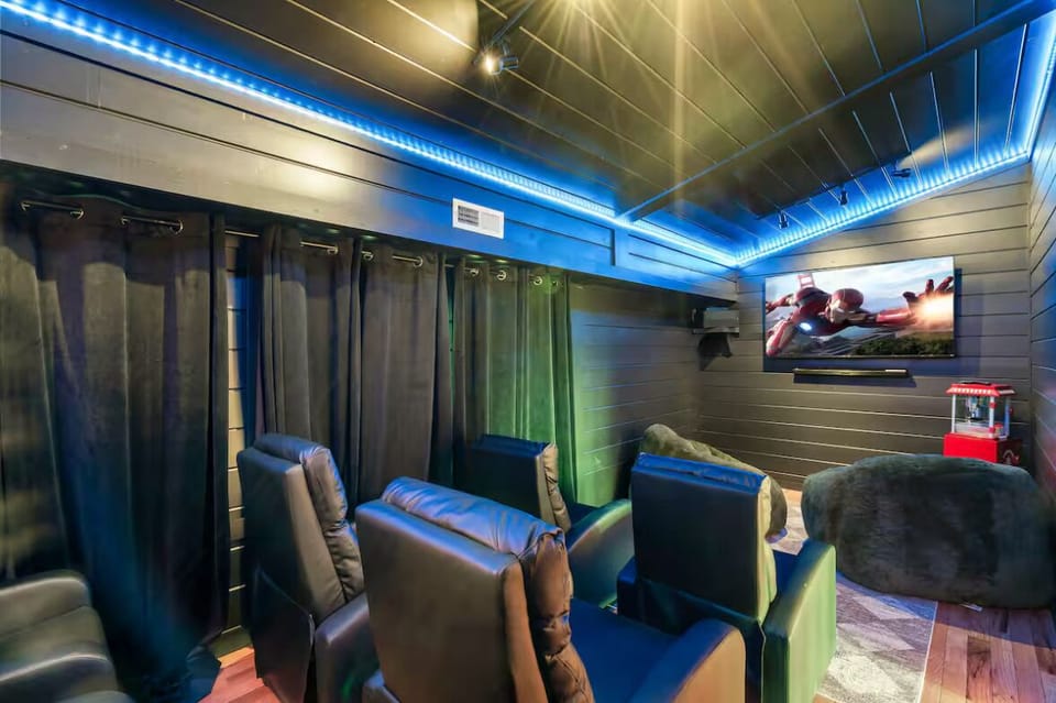 Newly renovated movie theater! With a popcorn machine and seating for at least 9