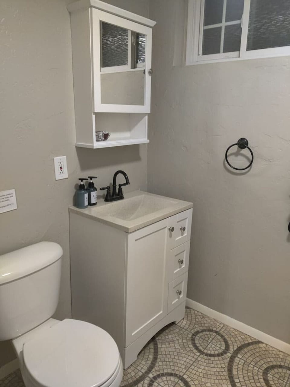 Relax and wash your trouble away in the clean bathroom.