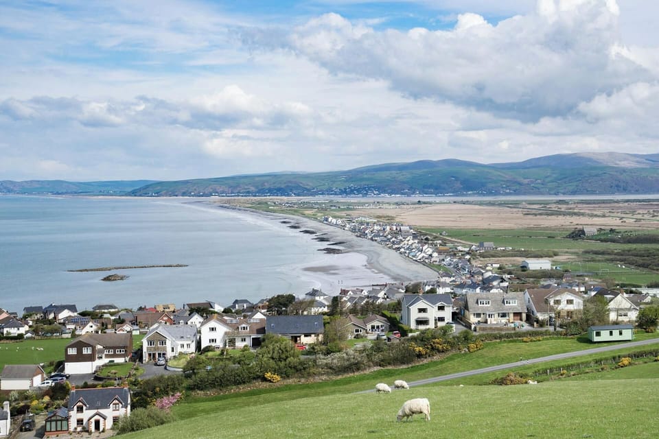 View over the fields towards Borth, the beach and the sea