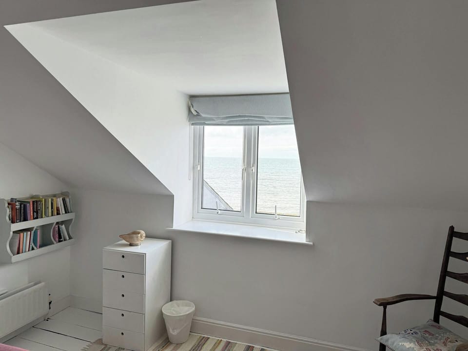 Second floor double bedroom with sea views