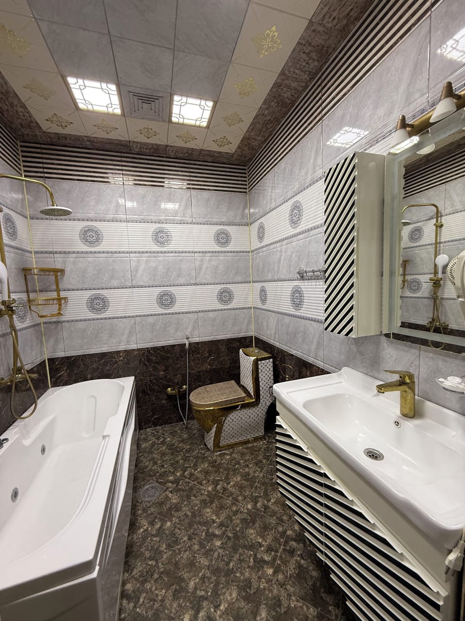 Family Studio Suite, Balcony, City View | Bathroom | Shower, hair dryer, slippers, towels