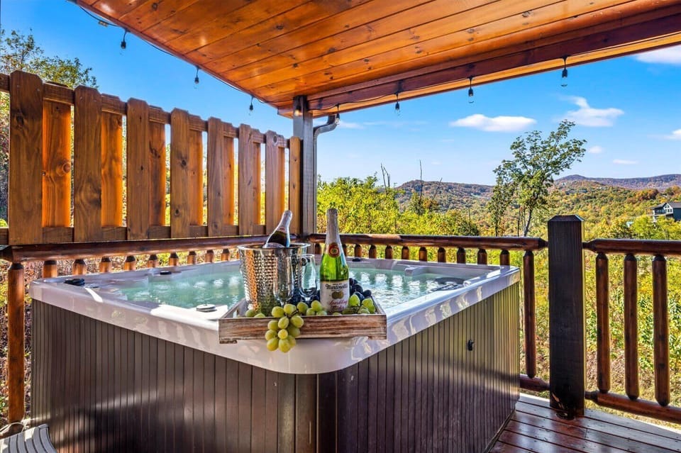 Relax in a private hot tub with stunning mountain views! Unwind under the covered deck, surrounded by nature, and soak in the peaceful Smoky Mountain atmosphere. The perfect spot for a romantic evening or a refreshing break after a day of adventure!