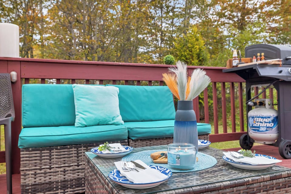 Comfortable outdoor seating area perfect for relaxing on the deck.
