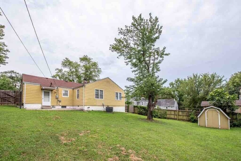 Large fenced in back yard. Perfect to let your kids or pet run after a long car ride!