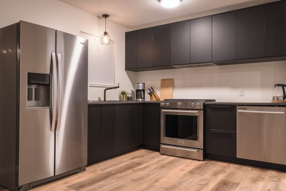 Kitchen with all the essentials, drip coffee maker, filtered water