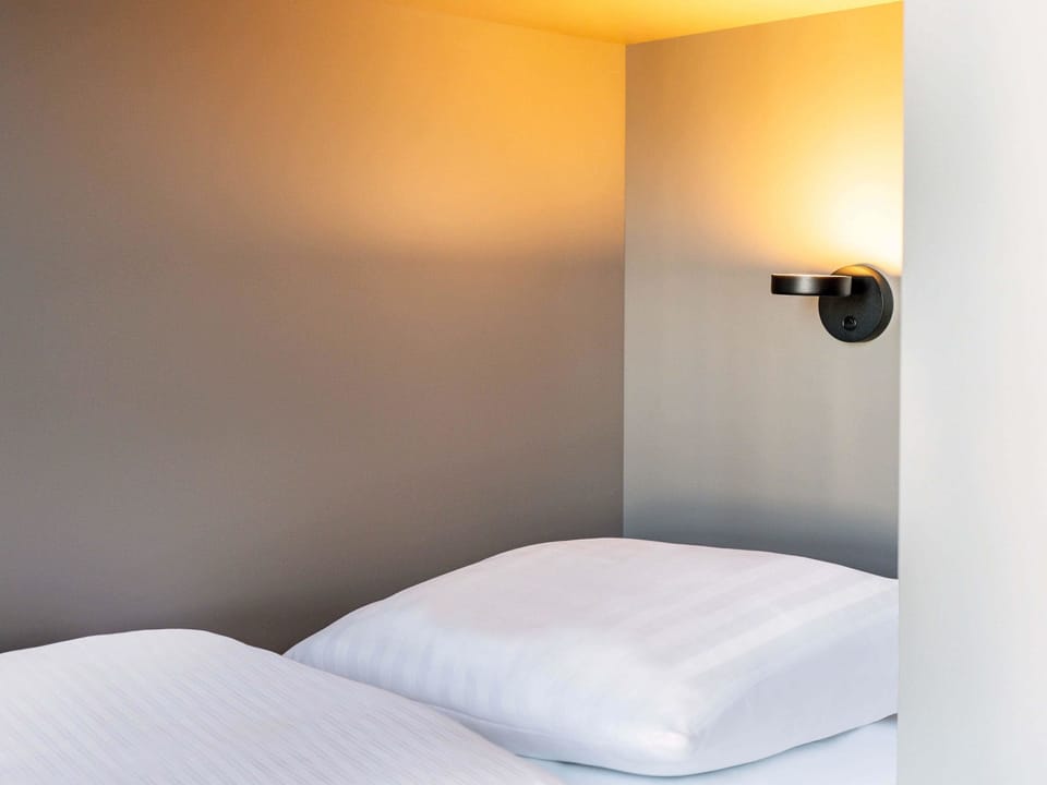 Blackout drapes, soundproofing, free WiFi, bed sheets