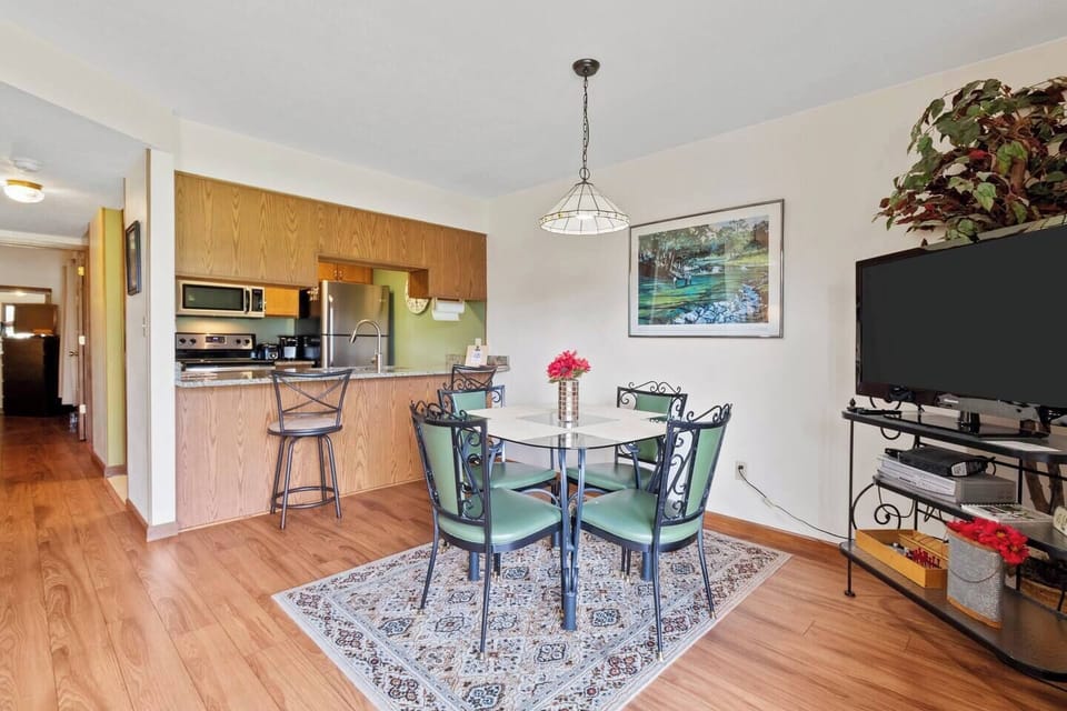 Dining area with two additional seats at bar