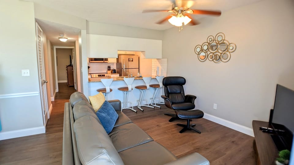 Living area with seating for four at counter