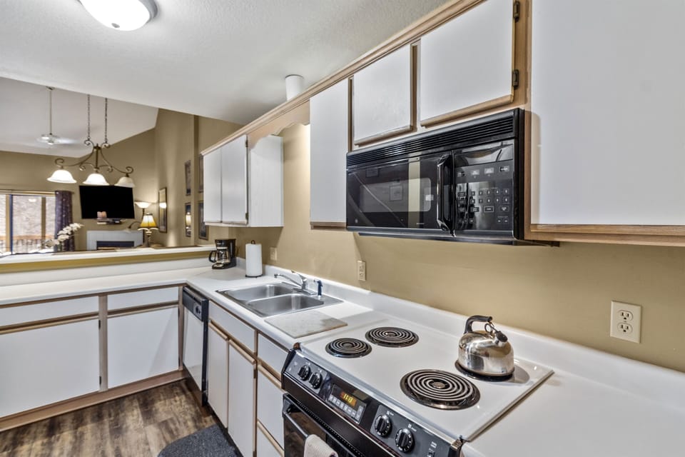 12 Cup Drip Coffee Brewer & Coffee Filters Provided in Full Size Kitchen.