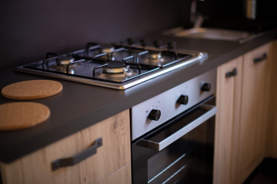 Apartment | Private kitchenette | Full-size fridge, microwave, oven, stovetop