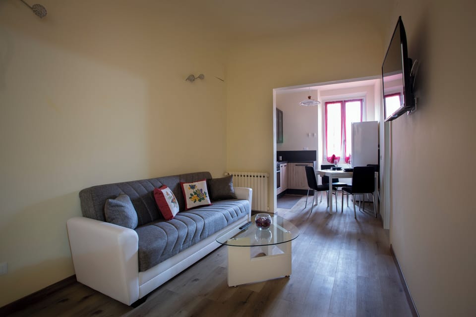Apartment | Living area | 23-inch flat-screen TV with digital channels