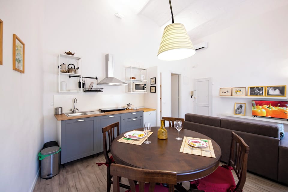 Apartment | Living area | 24-inch flat-screen TV with digital channels