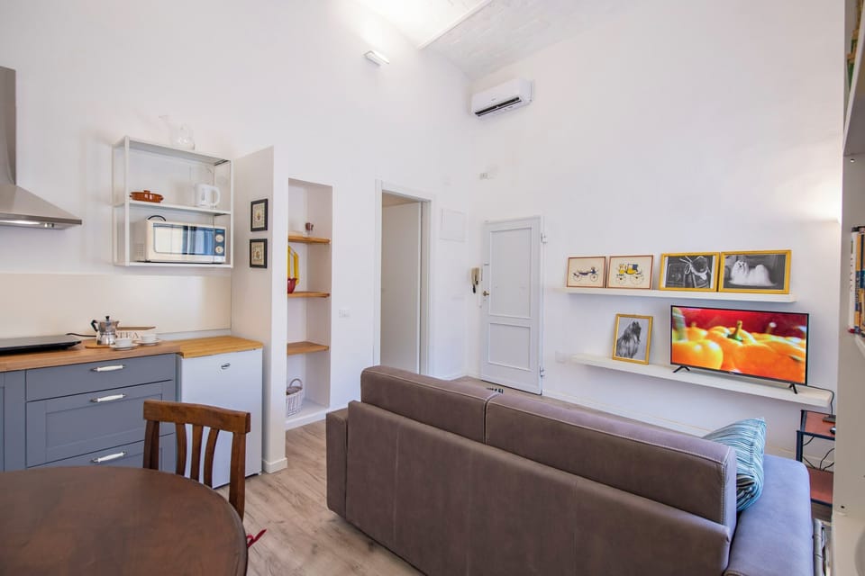 Apartment | Living area | 24-inch flat-screen TV with digital channels